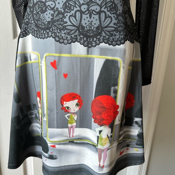 fun unique dress ! slight flare skirt and a sheer back and sleeves. - Picture 6 of 6